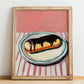 Éclair – on Striped Tablecloth, French French Pastry Still Life, no-text version framed in wood