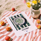 Tzatziki – on Striped Tablecloth, Greek Food Wall Illustration, unframed on coastal sand