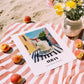 Ayran – Turkish Street Café Scene, Turkish Beverage Poster, unframed on coastal sand