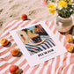 Plum Jam – Italian Street Café Scene, Jam Print, unframed on coastal sand
