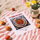 Currywurst – German Meat Dish, Food Bar Wall Art, unframed on coastal sand